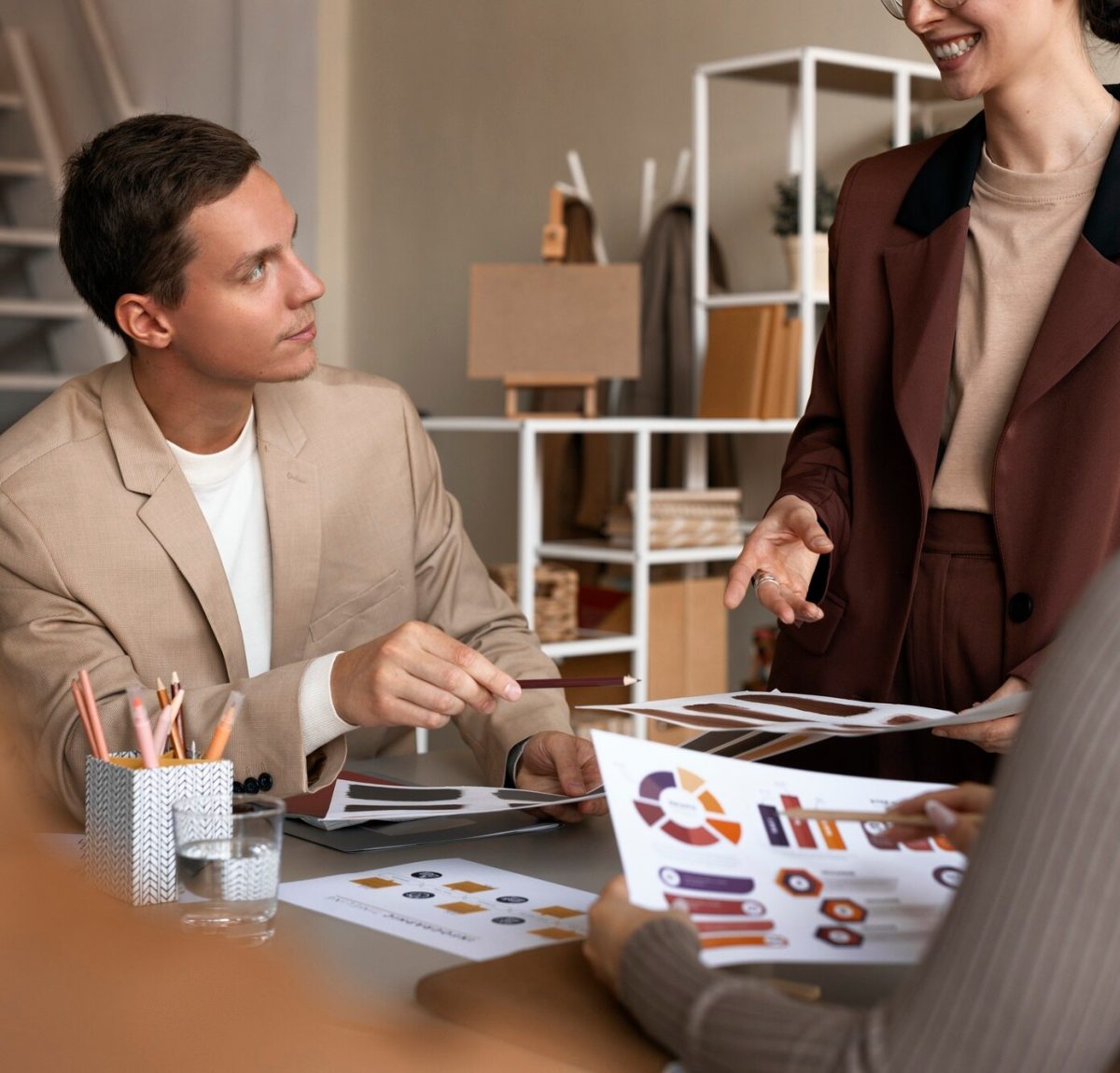 side-view-colleagues-working-as-team_23-2149636251